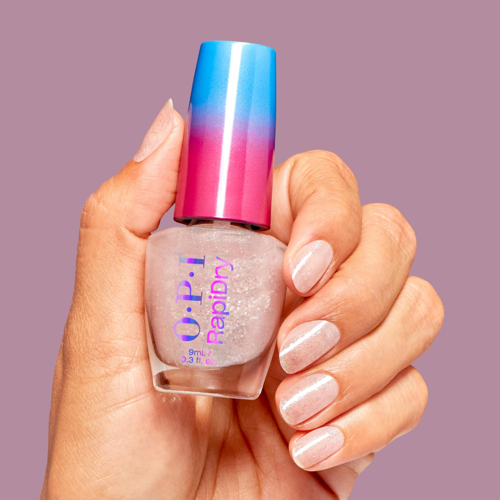 OPI manicure on hands in lifestyle scene illustrating quick-dry convenience benefit