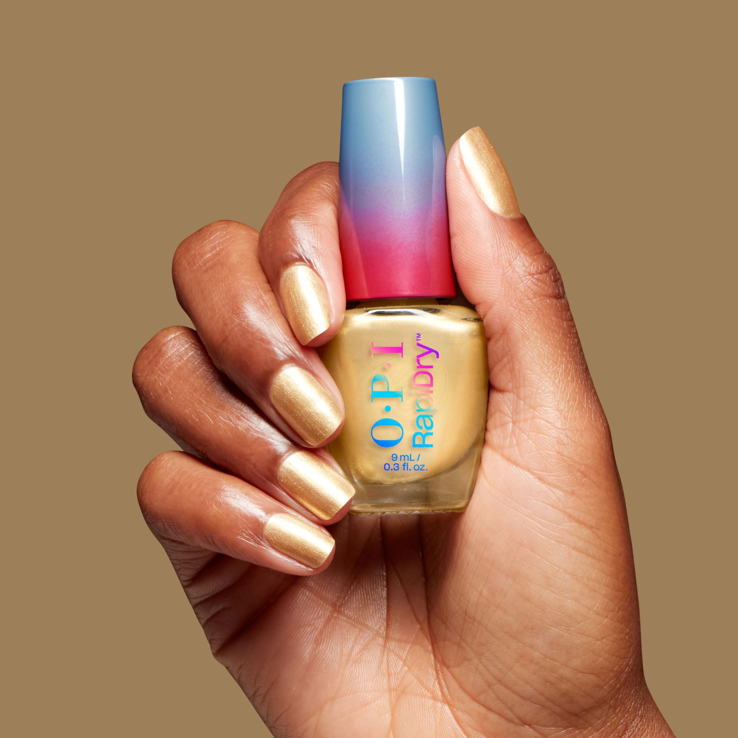 OPI manicure in a holiday setting highlighting festive, glossy sparkle