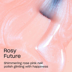 OPI Rosy Future swatch on fingertips demonstrating buildable sheer to opaque color