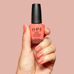 OPI nail with top coat showing Shrimp Cocktail high-shine protection