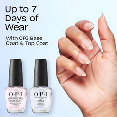 OPI Spread the Cherry on hands in holiday setting adding festive flair