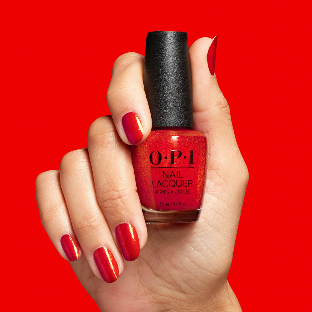 OPI bottle next to a coin for Spread the Cherry size and scale reference