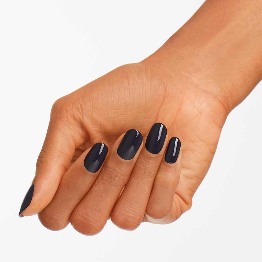 Hand model wearing OPI manicure in lifestyle setting showcasing versatile style benefit
