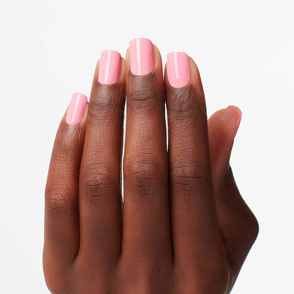 Manicure with OPI Suzi Nails New Orleans on fingernails showing polished, chip-resistant look