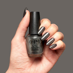Hand holding OPI bottle to show Tempted to Lick-orice bottle size and usability