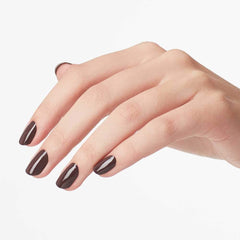 Color swatch palette of OPI brown shade comparing depth and opacity