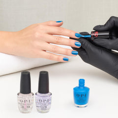 OPI lifestyle shot with Supergirl theme conveying confident, heroic look