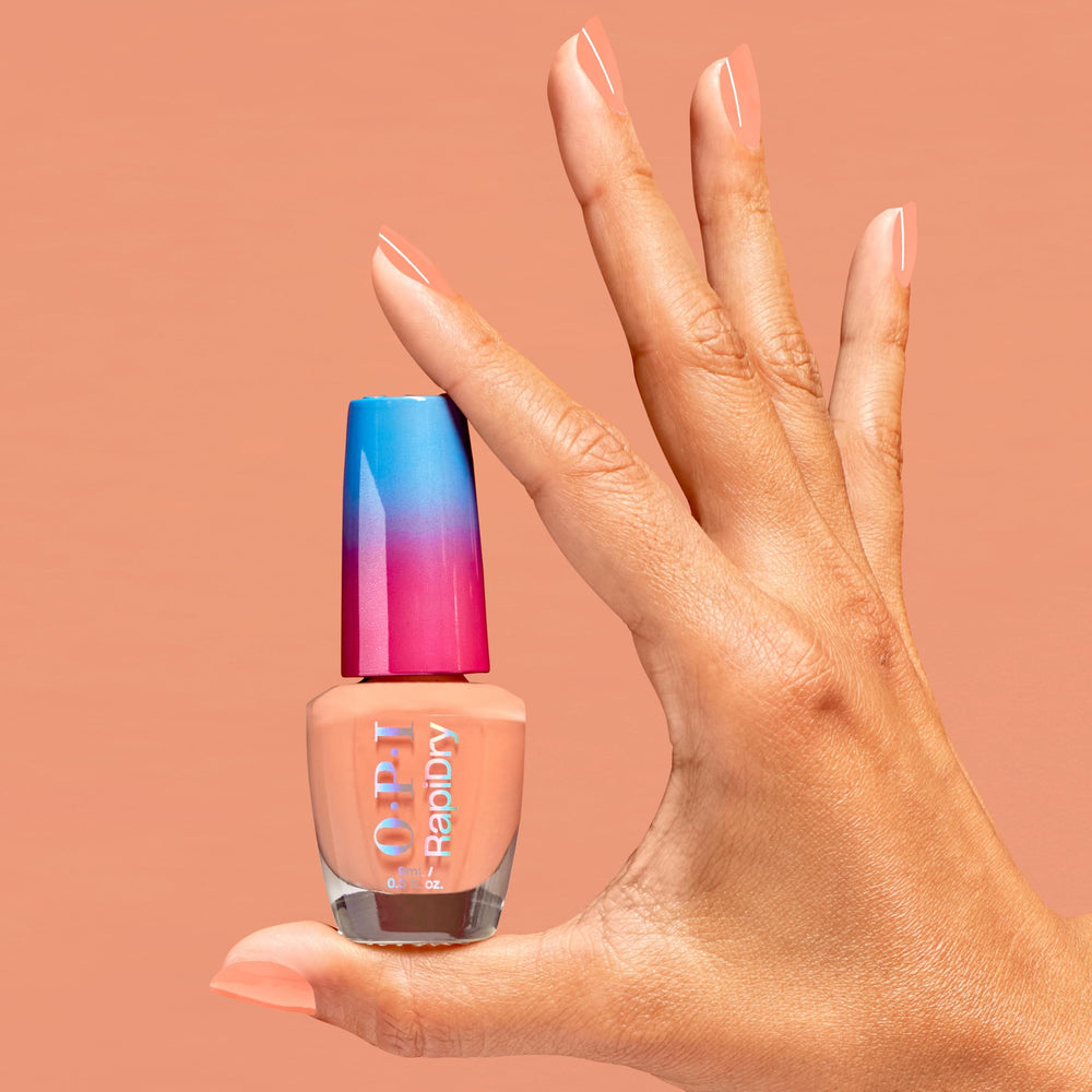 OPI Within Peach applied on manicured hands illustrating quick-dry glossy wear