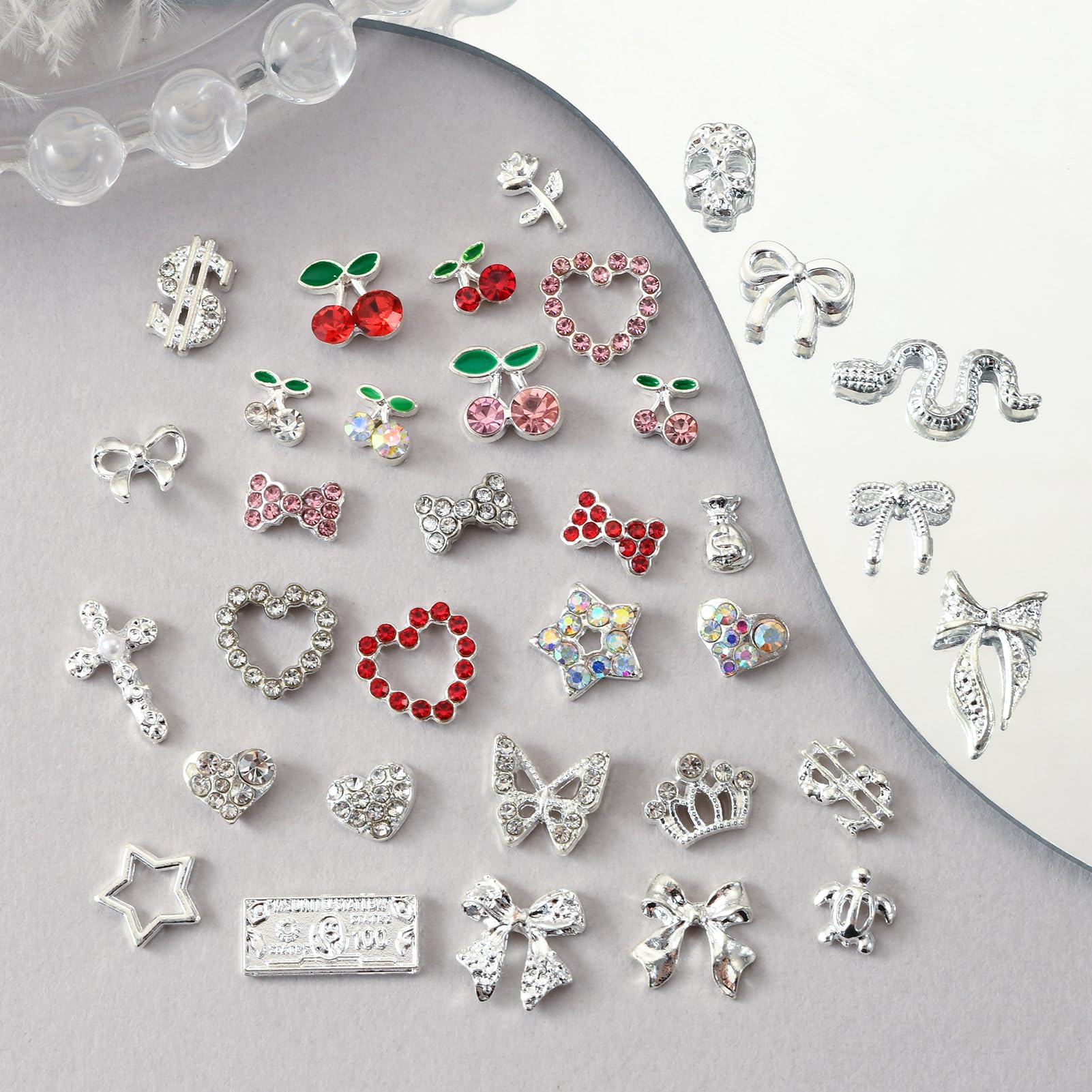 OPMADM spread of all 100 charms showing assortment for creative mixing