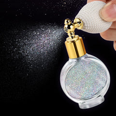 Oranllow glitter on forearm showing holographic sheen and buildable sparkle benefit