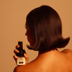Oribe Balm D'Or ingredient highlights with plant collagen and biotin for strength