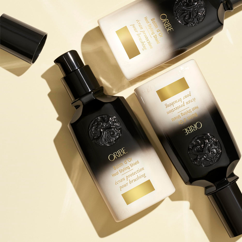 Oribe Balm D'Or creamy texture close-up demonstrating lightweight spreadability