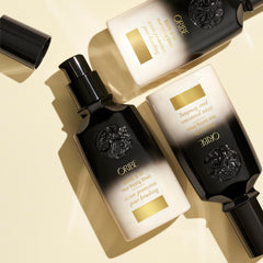Oribe Balm D'Or creamy texture close-up demonstrating lightweight spreadability