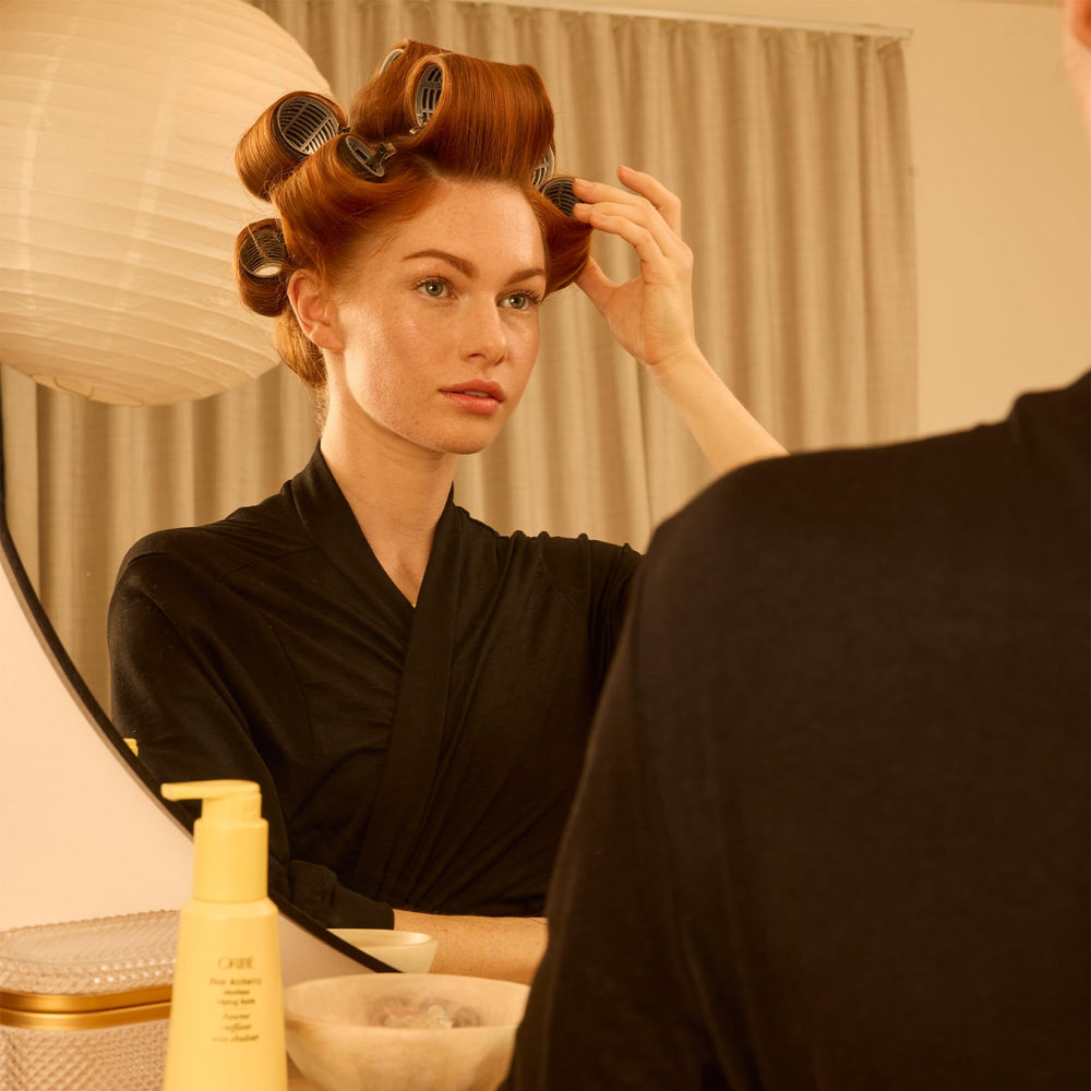ORIBE ingredients label close-up emphasizing clean formula and treatment-safe benefit