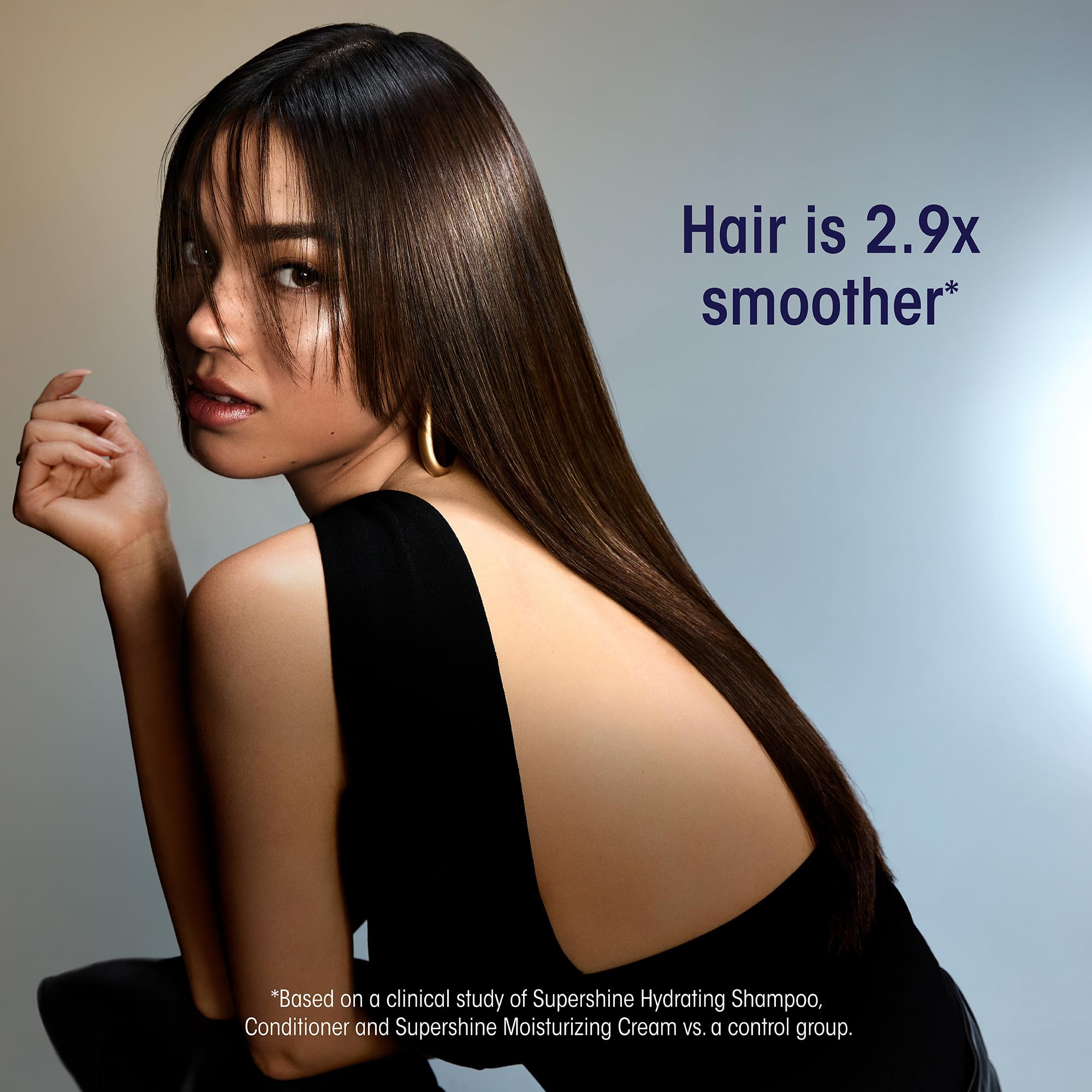 Lifestyle bathroom scene with Oribe bottle illustrating salon-finish results at home