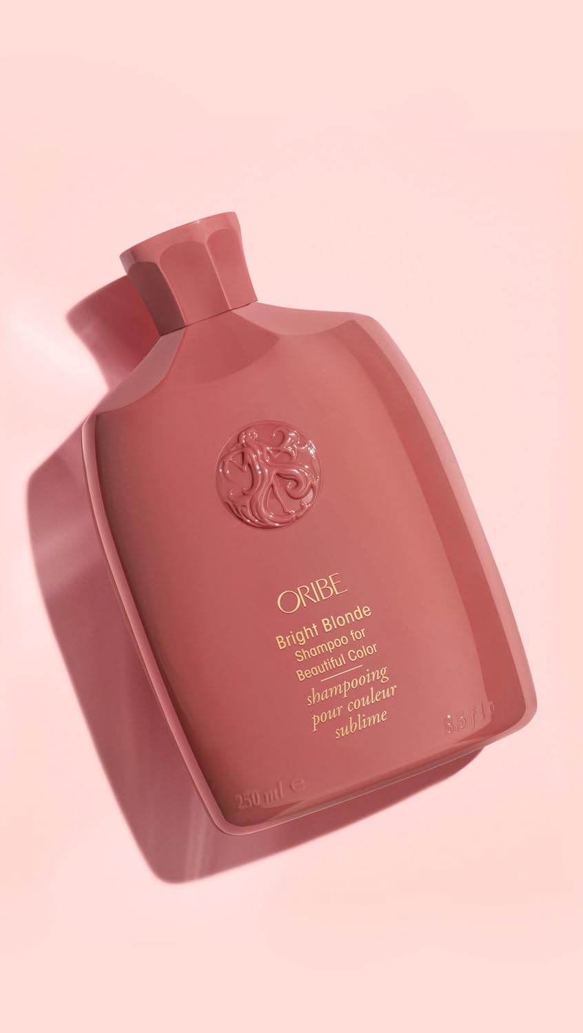 Oribe Bright Blonde 8.5 oz next to a ruler highlighting actual product size and portability