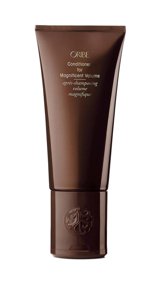 Oribe conditioner front bottle showing elegant packaging and brand uplift benefit