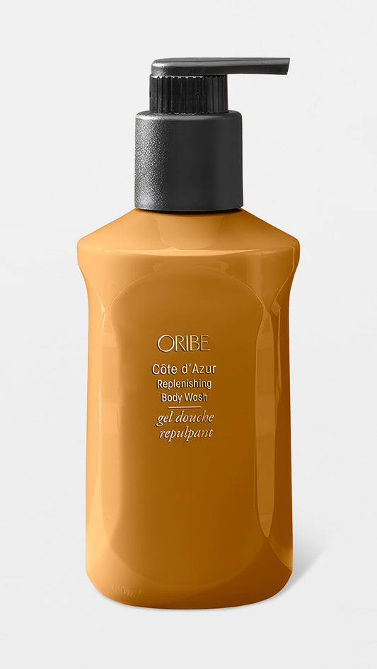 ORIBE close-up of pearlescent lather on hand benefit: gentle hydrating foam