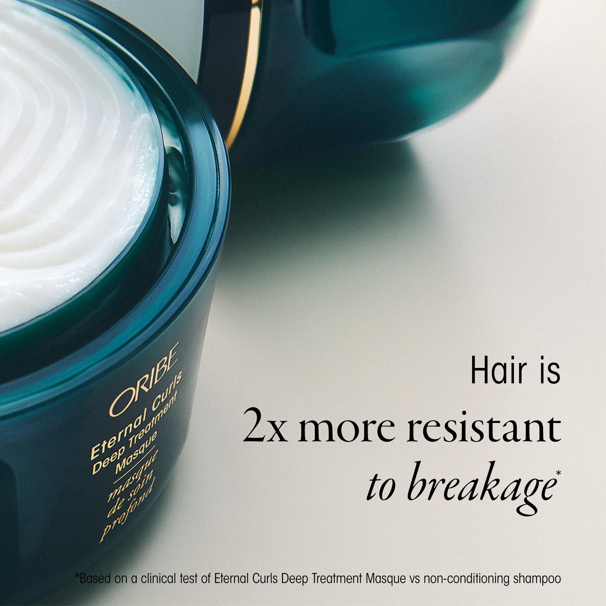 Oribe Eternal Curls being applied in shower to restore curls