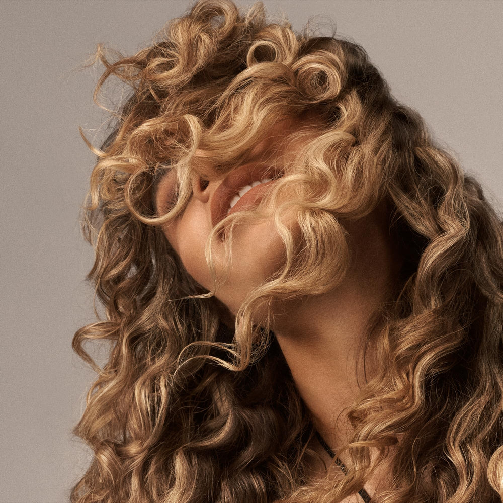 Oribe Eternal Curls ingredient label closeup showing formulation transparency benefit