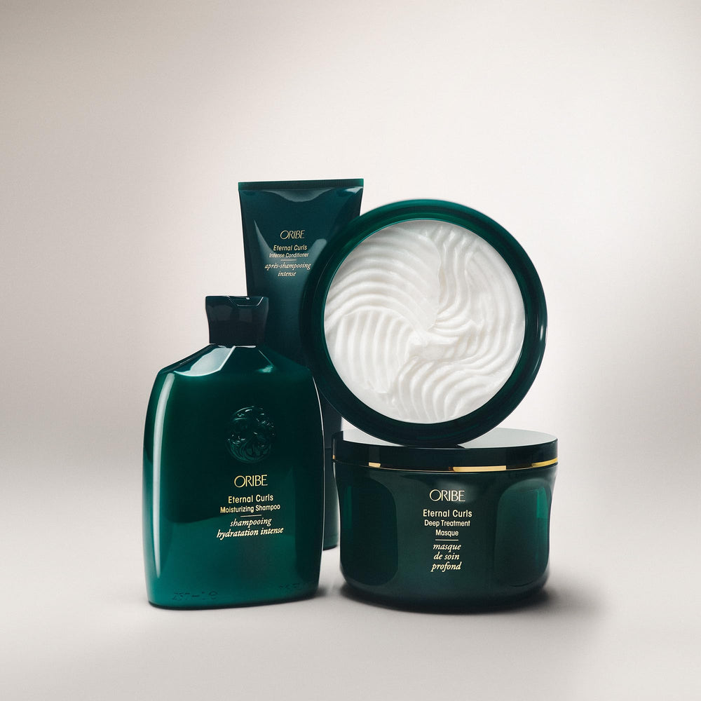 ORIBE lifestyle shot of curly-haired person showing softer, defined curls
