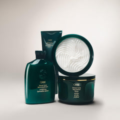 ORIBE lifestyle shot of curly-haired person showing softer, defined curls