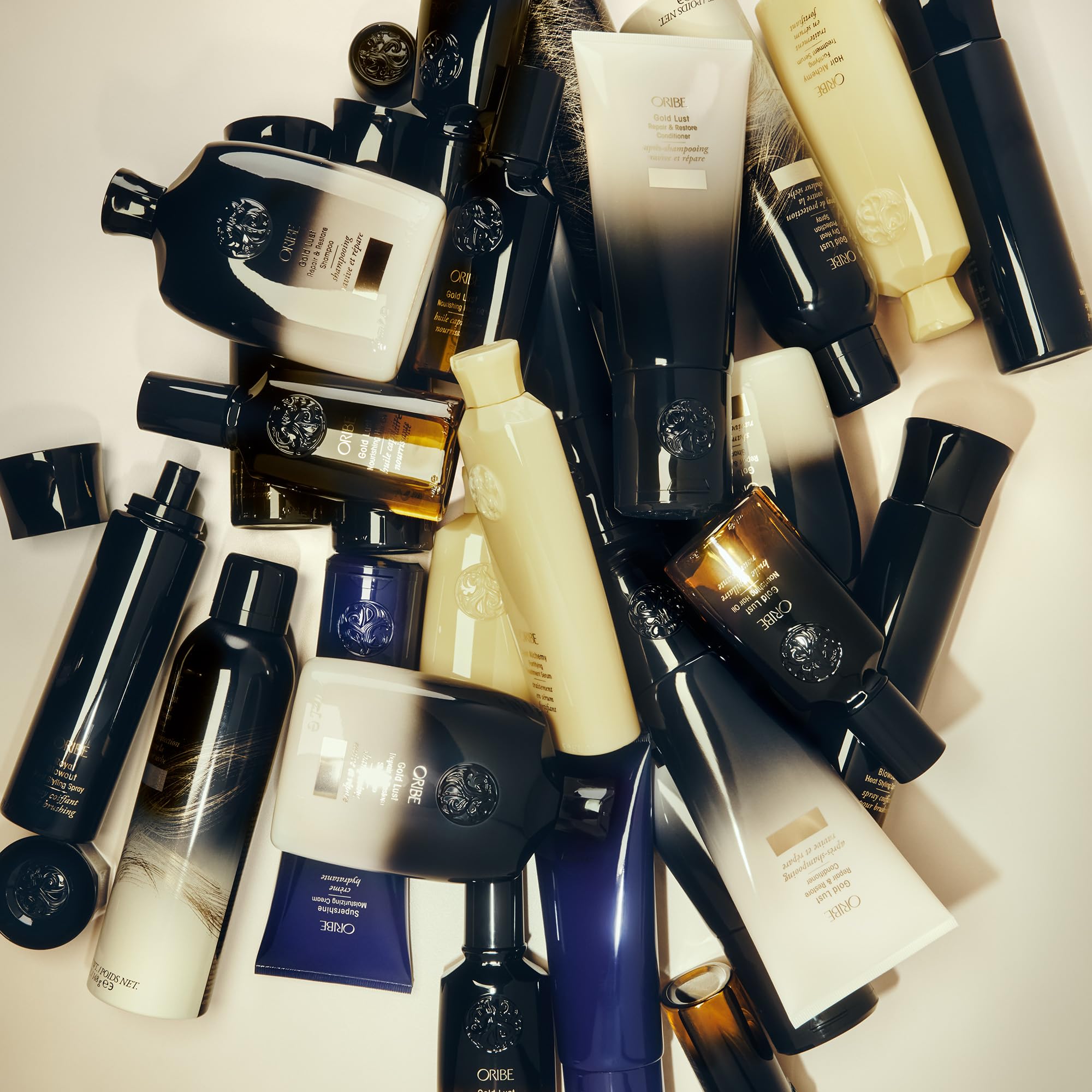 Oribe Gold Lust conditioner packaging cap and logo emphasizing premium brand quality