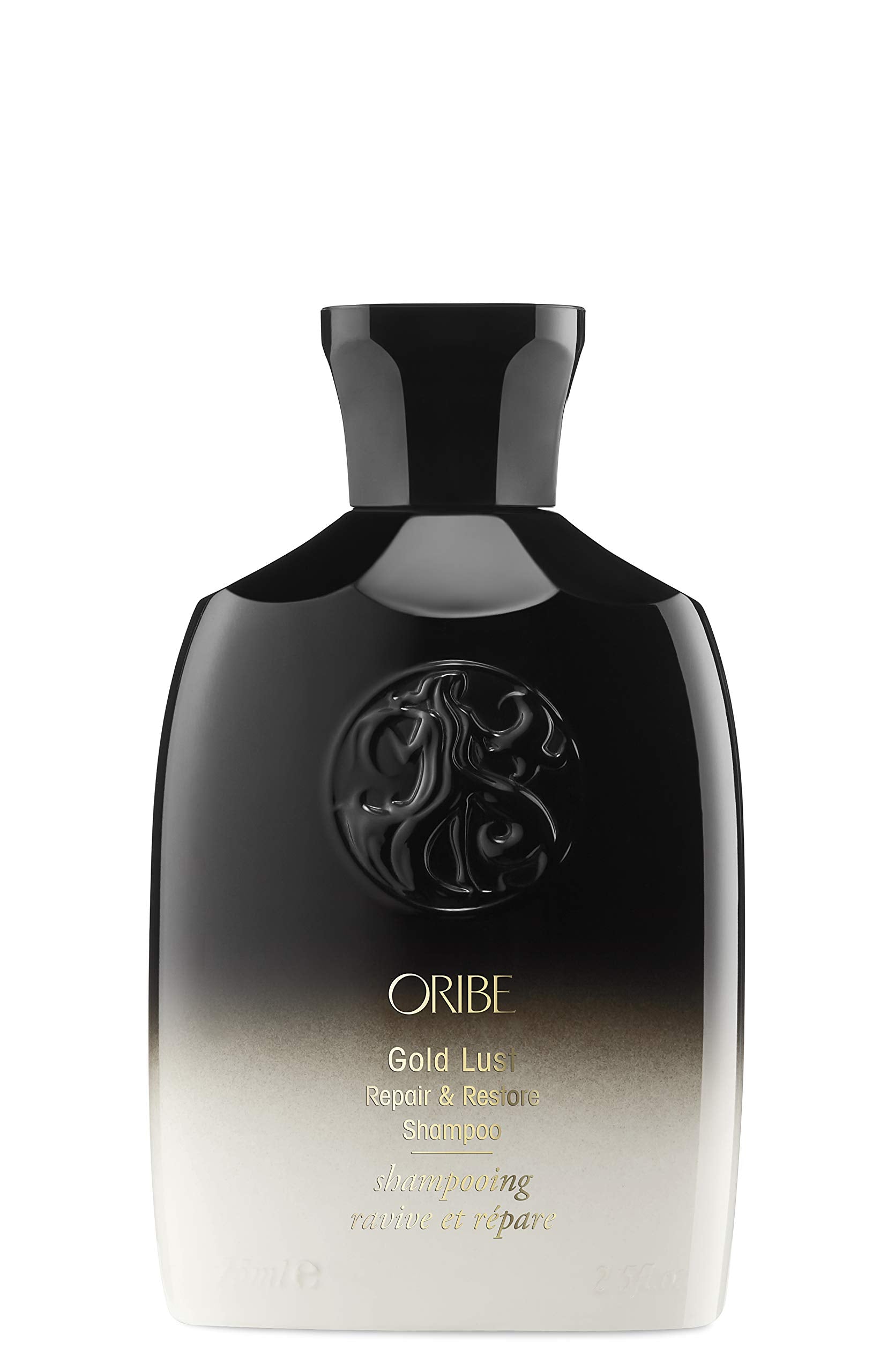 ORIBE Gold Lust Conditioner pump detail showing creamy formula and detangling benefit