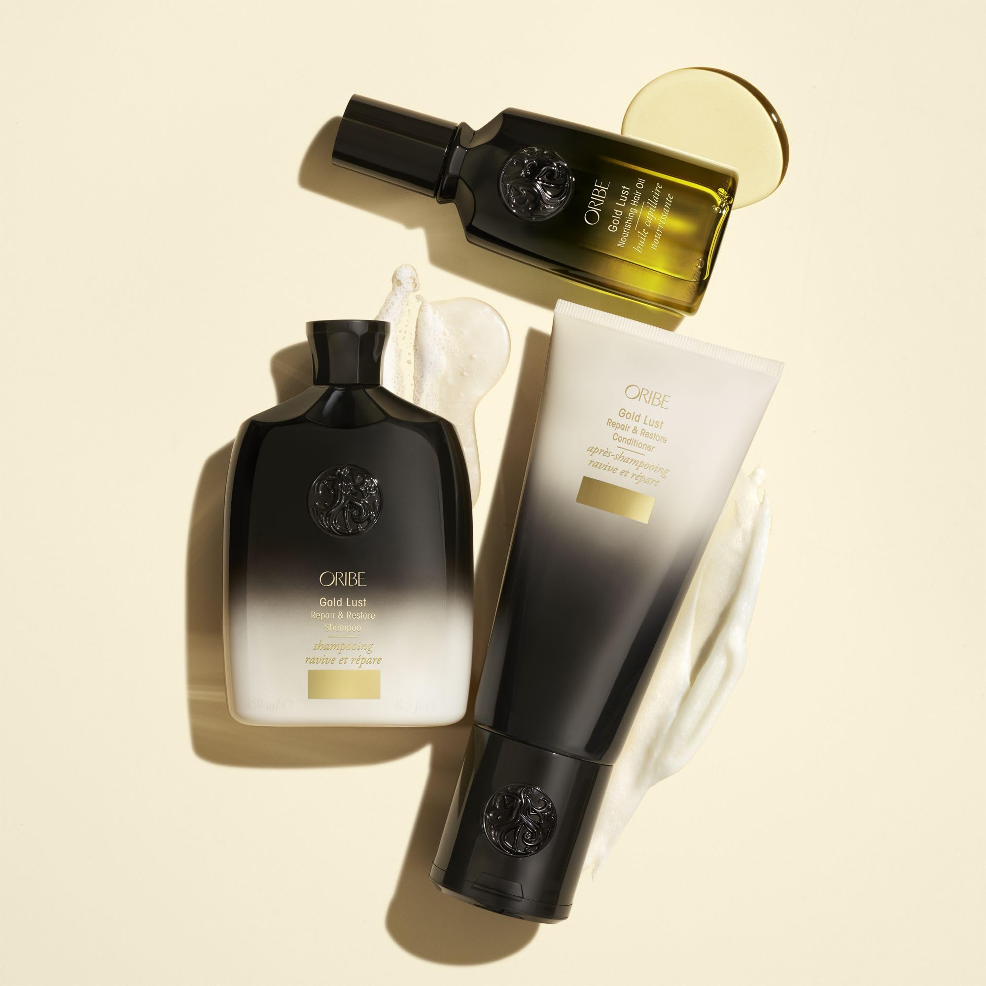 Oribe Gold Lust shampoo in shower environment conveying easy use benefit