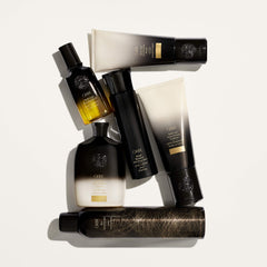 Oribe Gold Lust Mask placed on bathroom shelf suggesting everyday ritual use