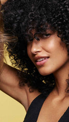 Oribe Hair Alchemy before and after strand comparison showing improved elasticity