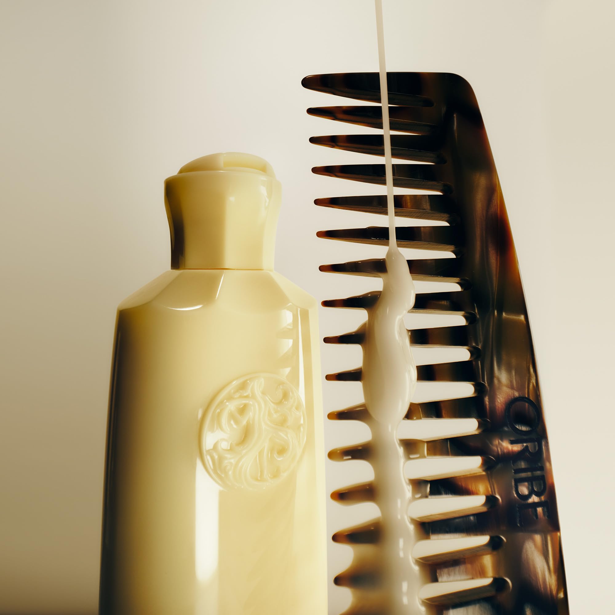 Oribe ingredients label highlighting hyaluronic complex and cotton seed extract benefits