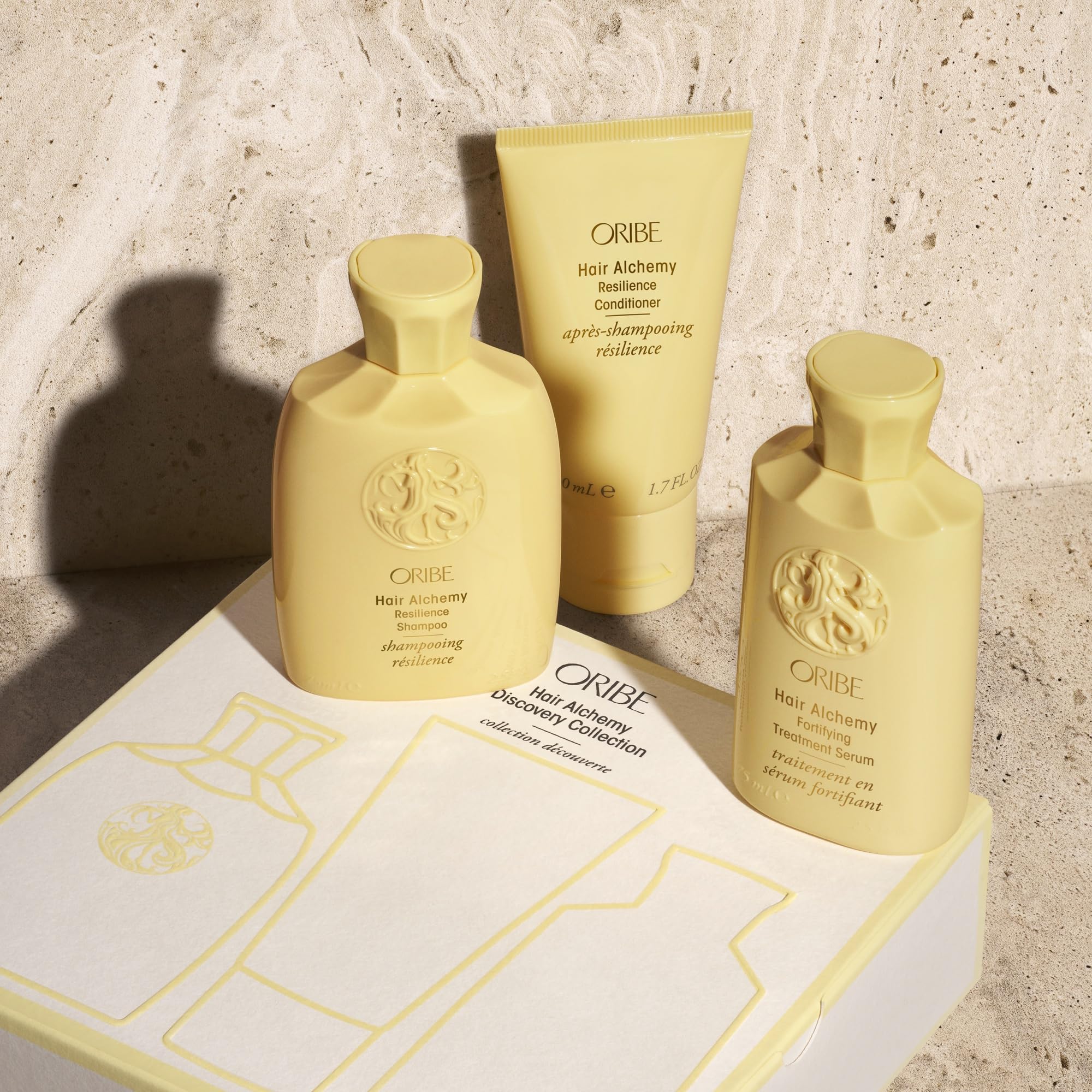 Oribe shampoo bottle detail highlighting gentle cleansing benefit