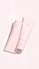 Oribe conditioner being applied to scalp delivering soothing hydration and flake removal