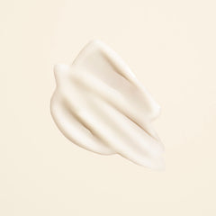 Oribe Matte Waves being applied to damp hair to create beachy waves