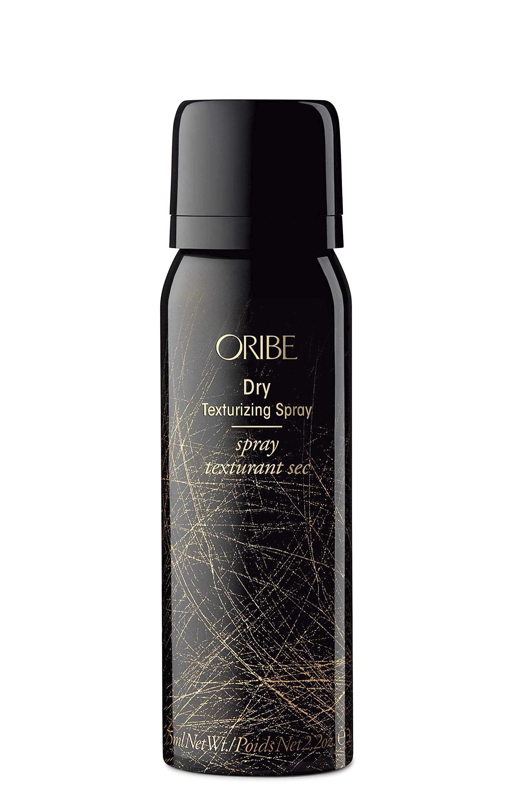 ORIBE products grouped on bathroom shelf suggesting salon results and everyday luxury benefit