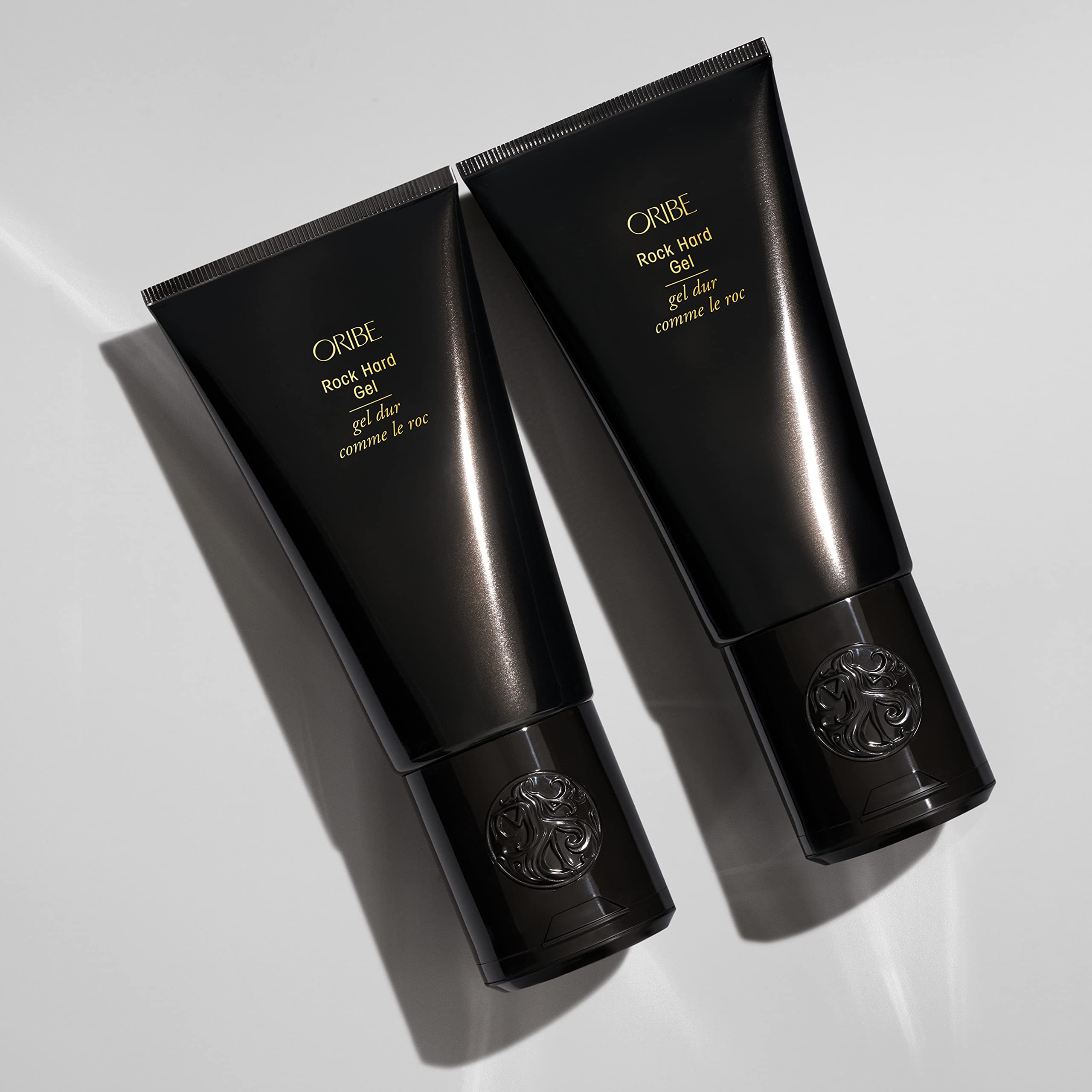 Oribe rock hard gel in use creating defined spikes with long-lasting hold
