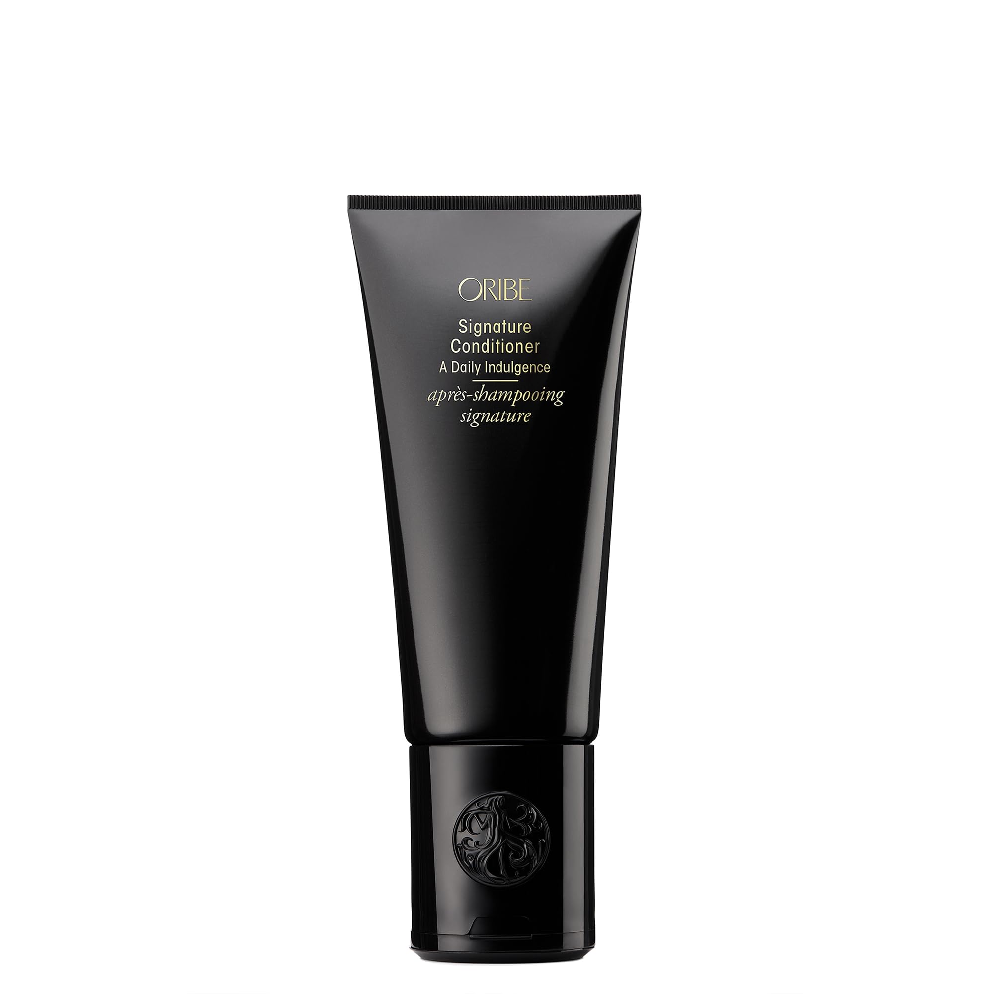 Oribe signature conditioner front bottle showing premium packaging and brand benefit