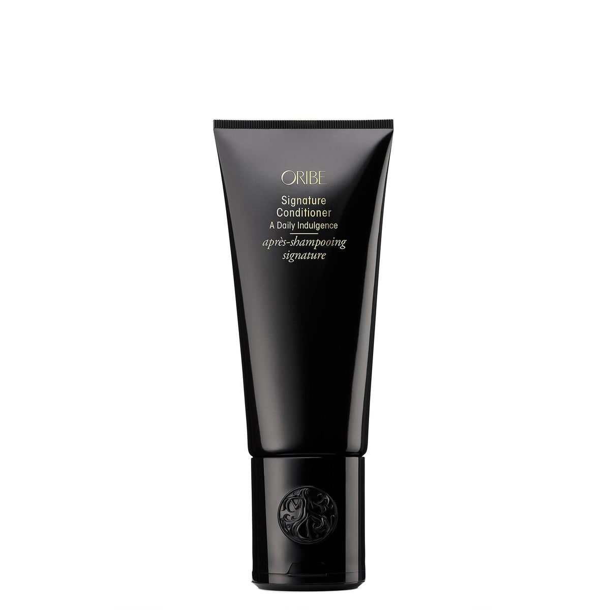 Oribe signature conditioner front bottle showing premium packaging and brand benefit