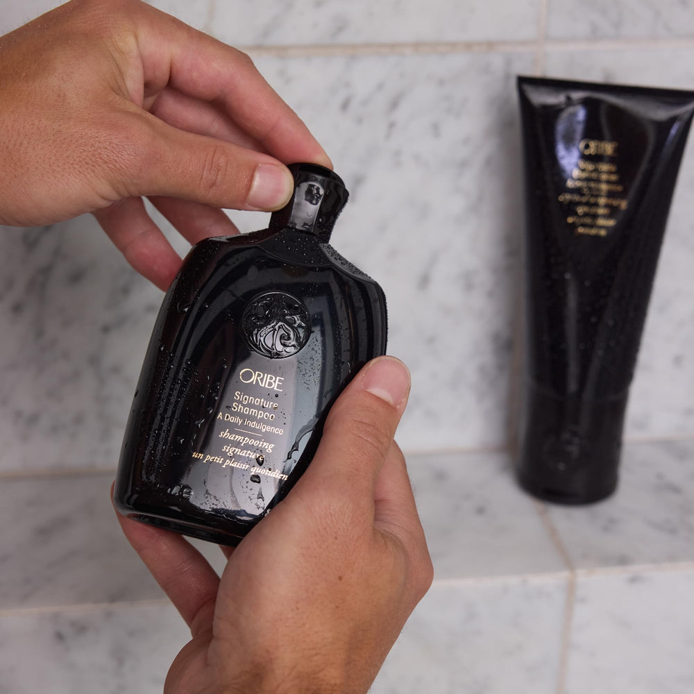 Oribe signature conditioner label detail highlighting clean-formula ingredients benefit