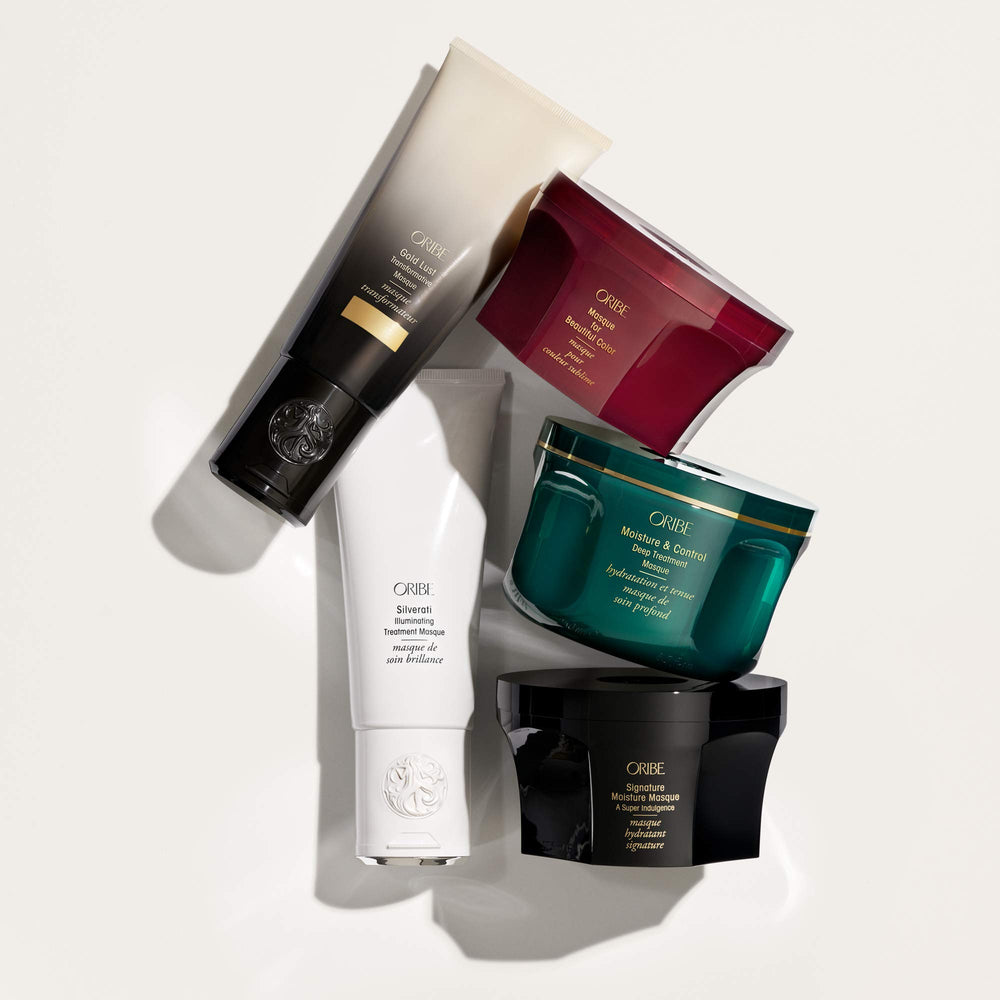 Oribe Signature Moisture Masque on bathroom shelf styled for luxurious routine