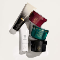 Oribe Signature Moisture Masque on bathroom shelf styled for luxurious routine