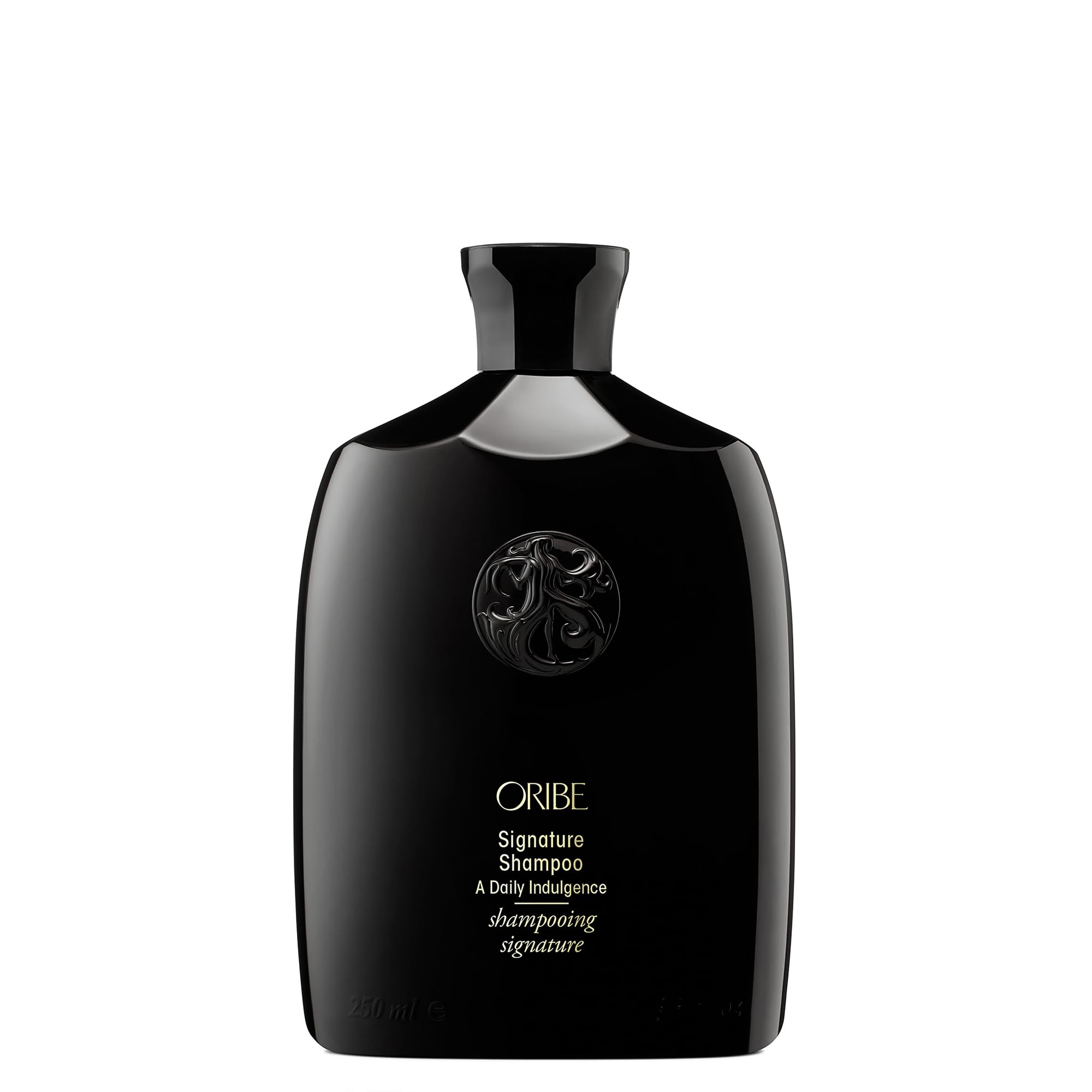Oribe signature shampoo front bottle showing elegant packaging and luxury benefit