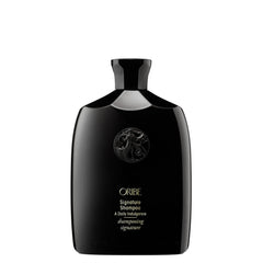 Oribe signature shampoo front bottle showing elegant packaging and luxury benefit