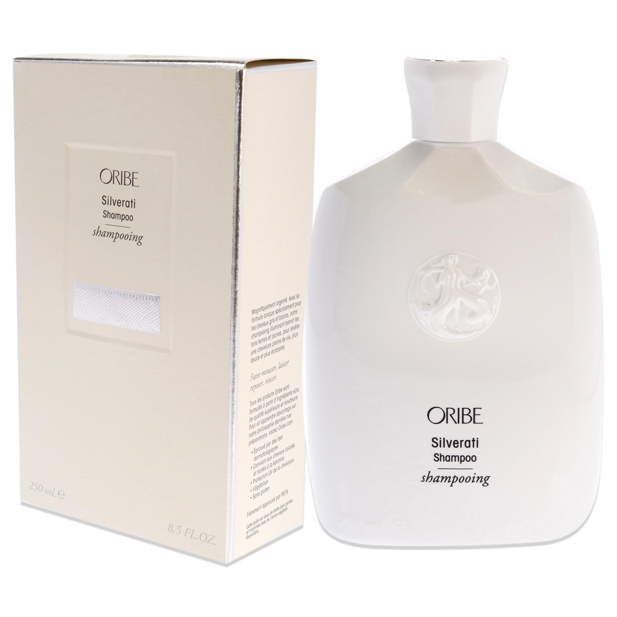 Oribe Silverati bottle in hand for scale showing generous 8.5 oz size