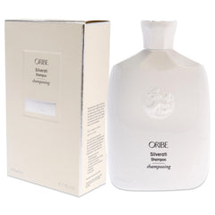 Oribe Silverati bottle in hand for scale showing generous 8.5 oz size