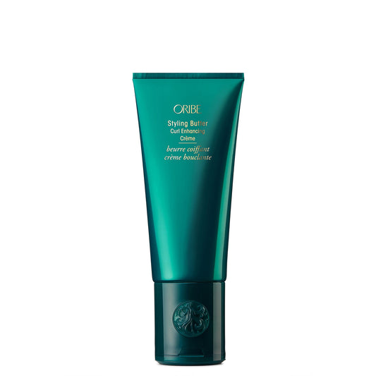 Oribe jar front view showing product and elegant packaging for shelf appeal