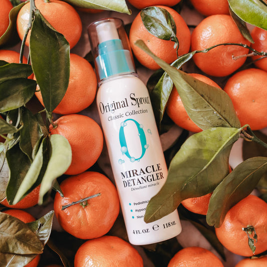 Original Sprout detangler nozzle close-up demonstrating fine mist for gentle application