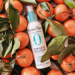 Original Sprout detangler nozzle close-up demonstrating fine mist for gentle application
