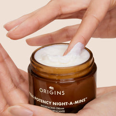 Origins open jar top view revealing smooth resurfacing formula